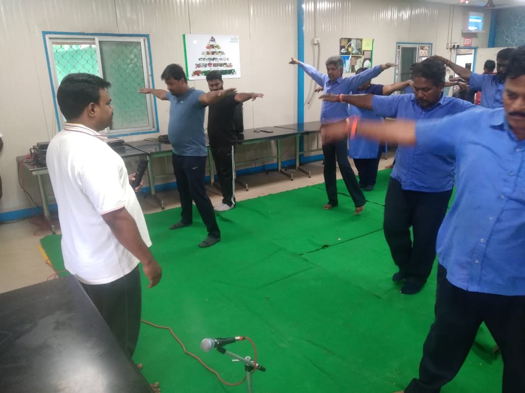 Dr. Gopi demonstrating physiotherapy exercise