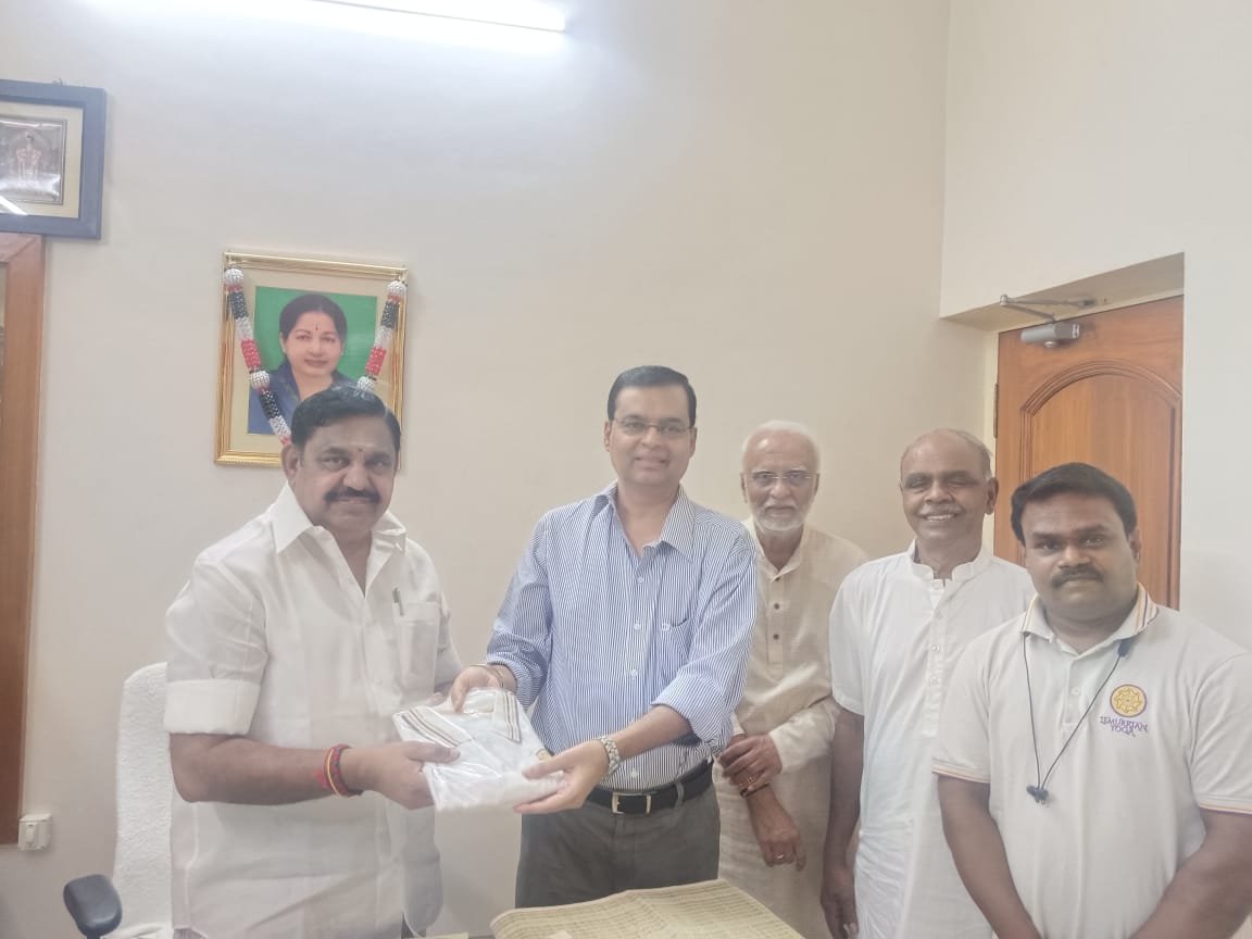 Dr. Gopi Murugan presenting to former CM Palaniswami