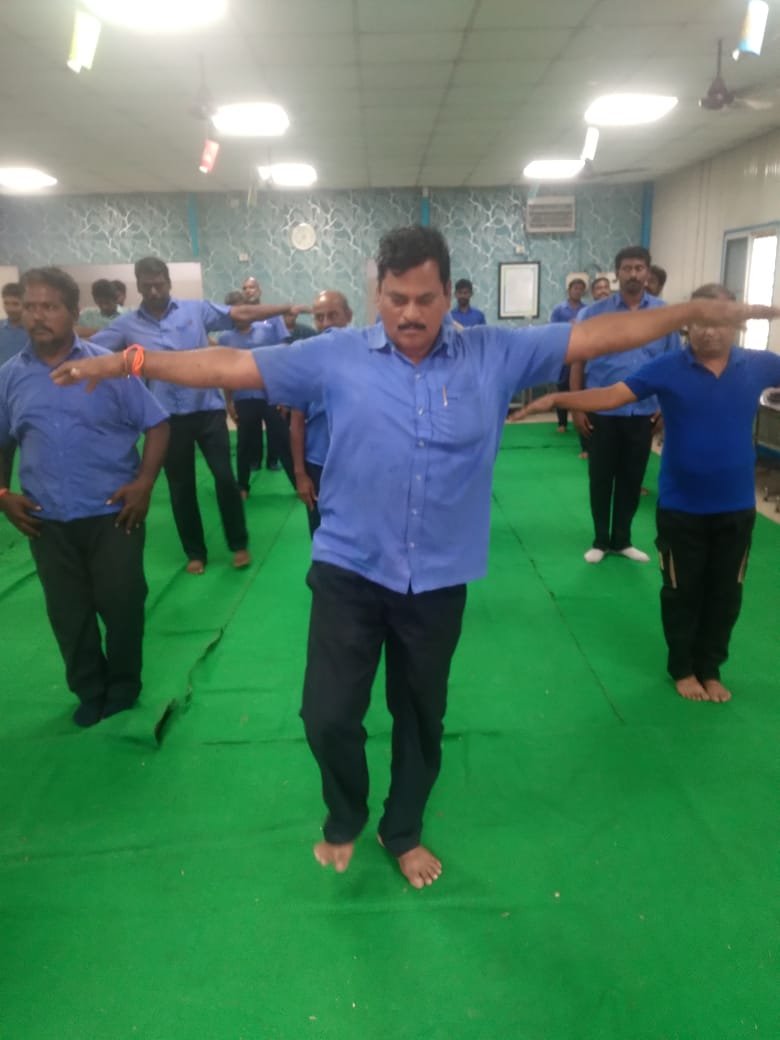 Dr. Gopi Murugan posture training in industrial workplace